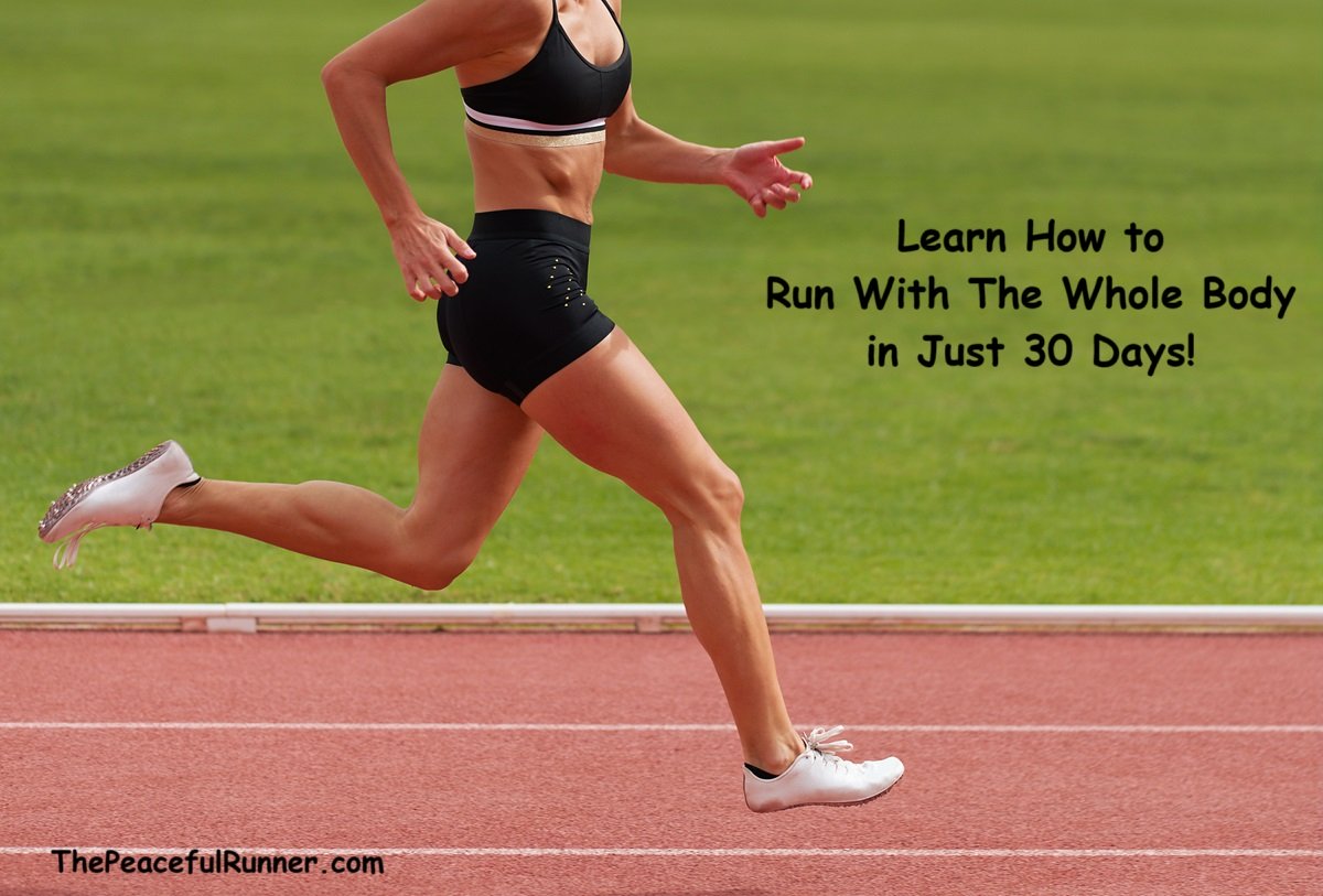 Strong female runner  running with good form and posture on a running track